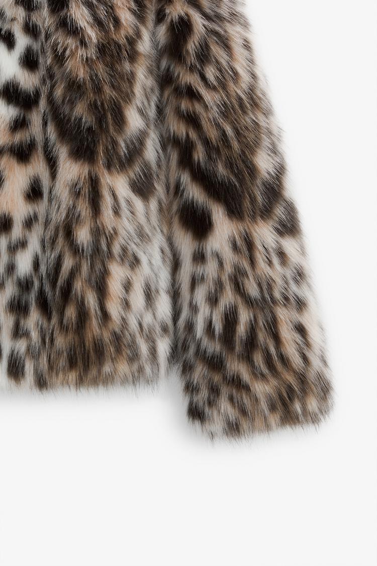 VESTE EN FAUSSE FOURRURE LEOPARD