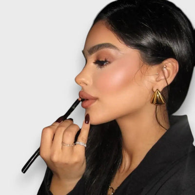 Nuna – Boucles d'oreilles dorées au caractère sculptural
